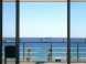 a photograph of a balcony facing the Mediterranean, a place eva works from sometimes